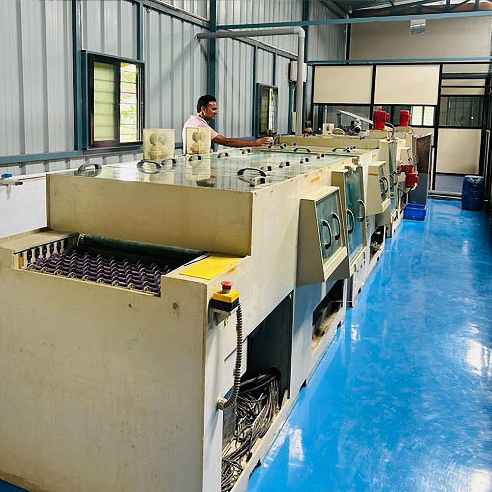 Automated PCB fabrication and assembly machine at AEAR facility